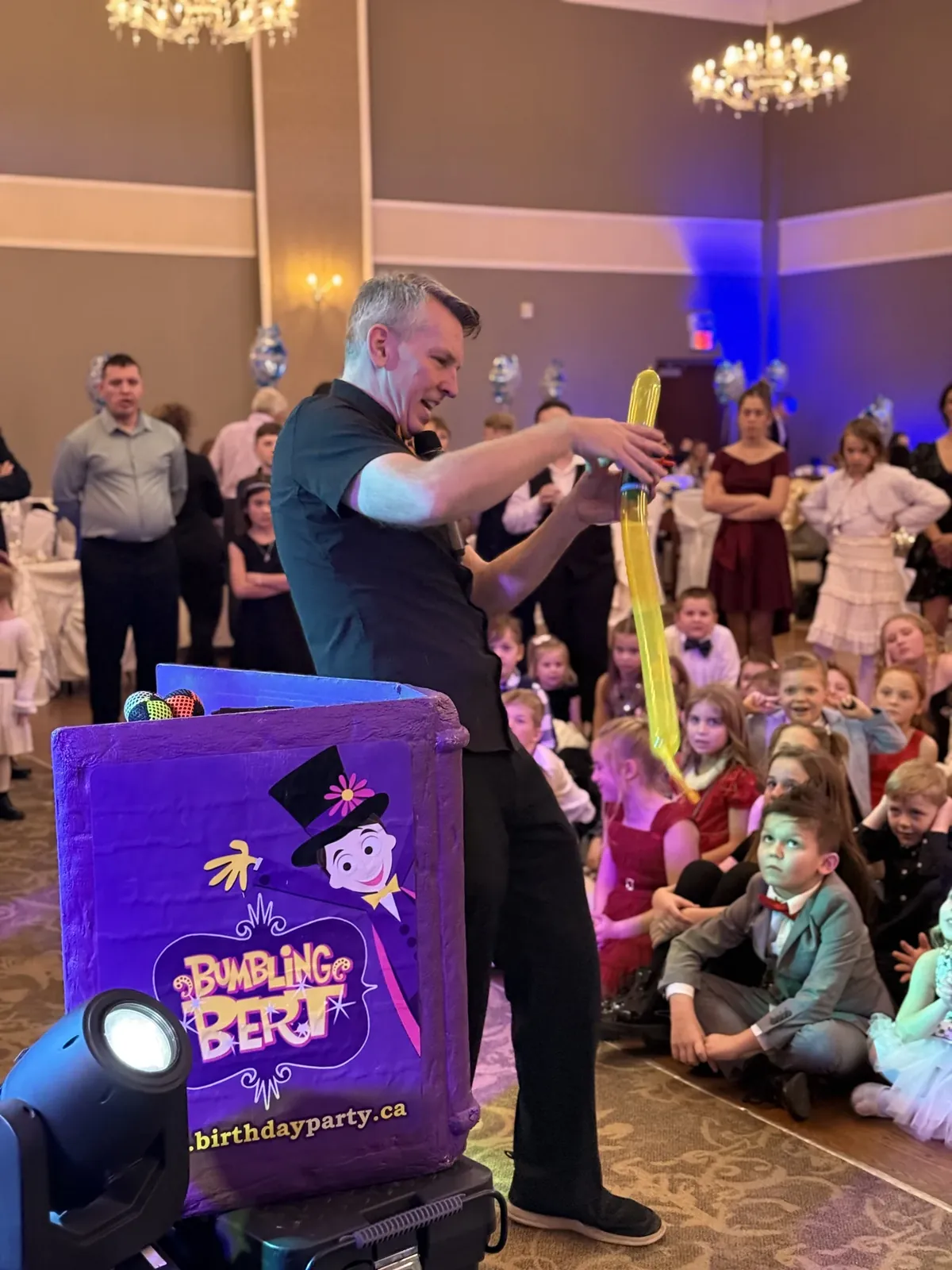 Bumbling Bert performing an interactive magic show
